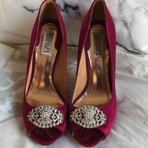 Red heels in satin by Badgley Mischka